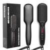 Image of Black power straightener hairbrush shown with its retail box on a white background. The brush has a flat rectangular head, bristles on one side, and a digital temperature display on the handle.