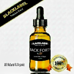 A 10ml glass dropper bottle of Blacklabel Sandalwood Amber essential oil