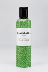 A 4 oz bottle of BLACKLABEL Face Exfoliating Scrub with Jojoba Beads, featuring bright green scrub inside a clear bottle with a black cap and a white label.
