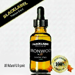A 10ml glass dropper bottle of Blacklabel Sandalwood Amber essential oil